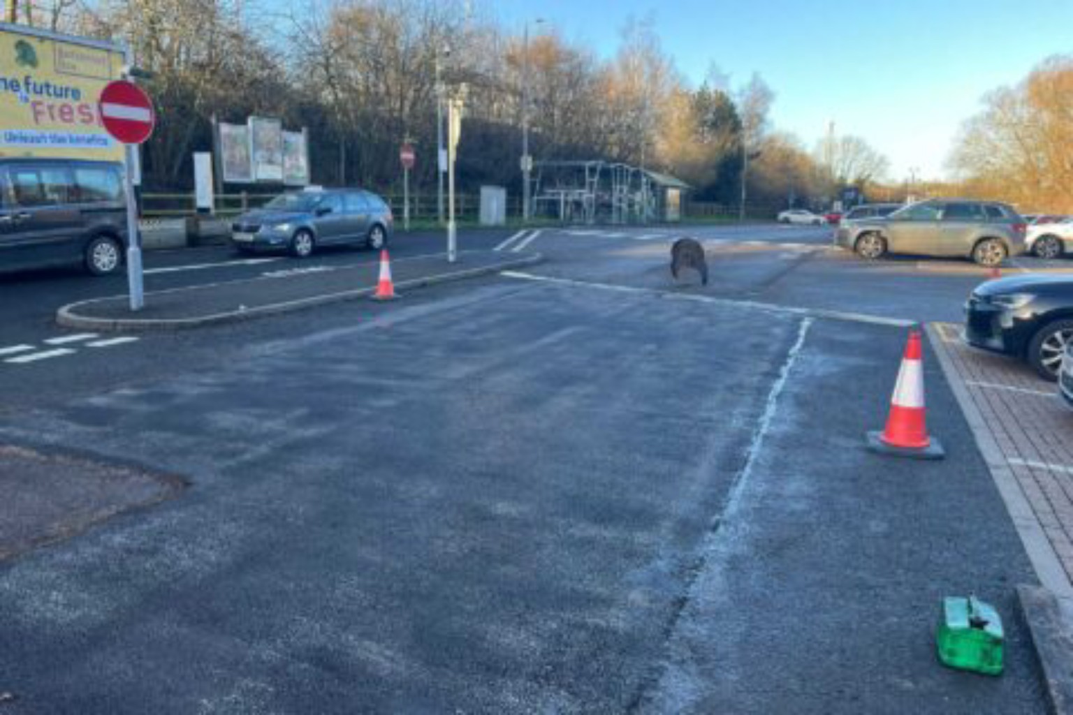 Repaired public carriageway in Blairgowrie, with cones beside the newly surfaced area