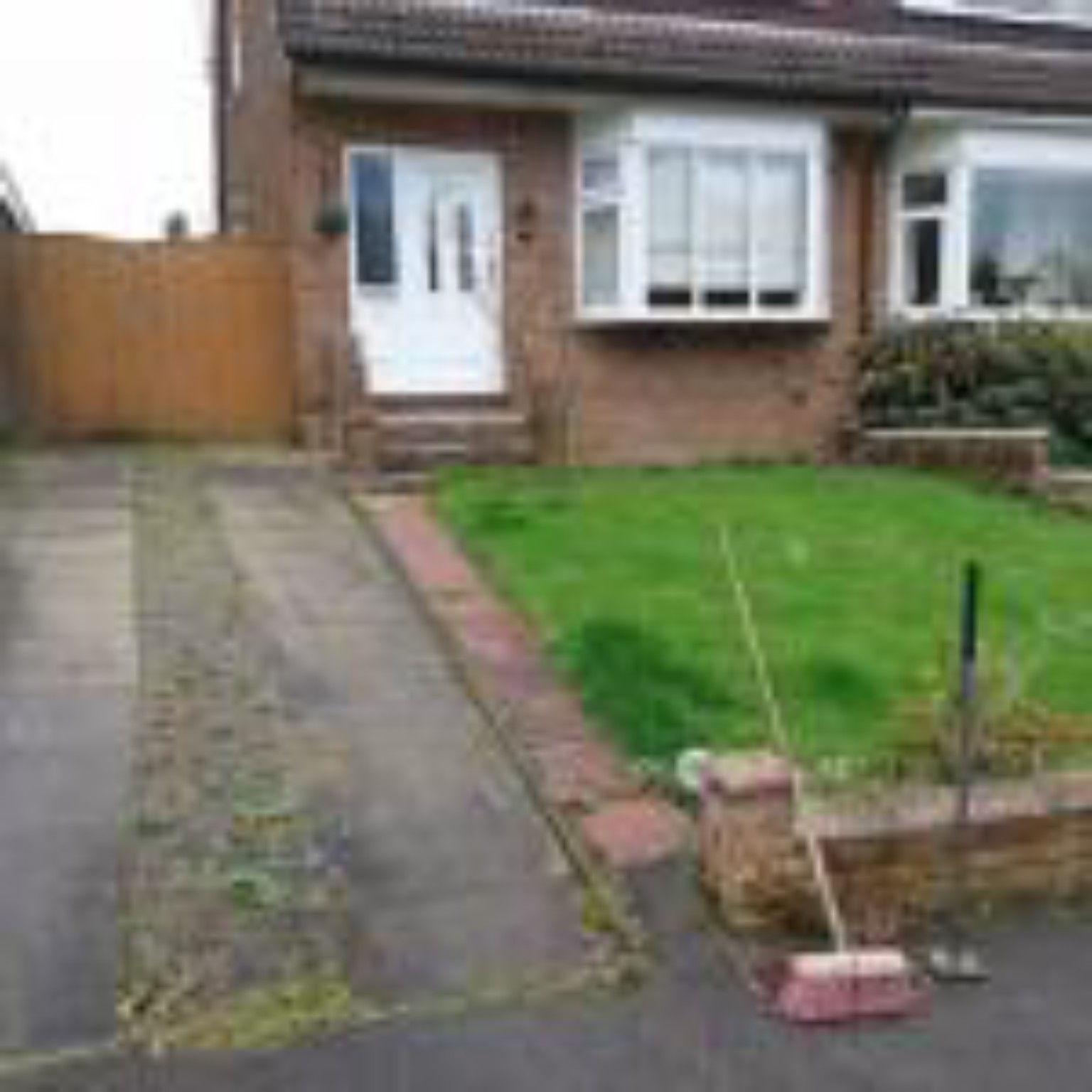 Existing driveway and front lawn near Dunfermline in Fife before tarmac surfacing