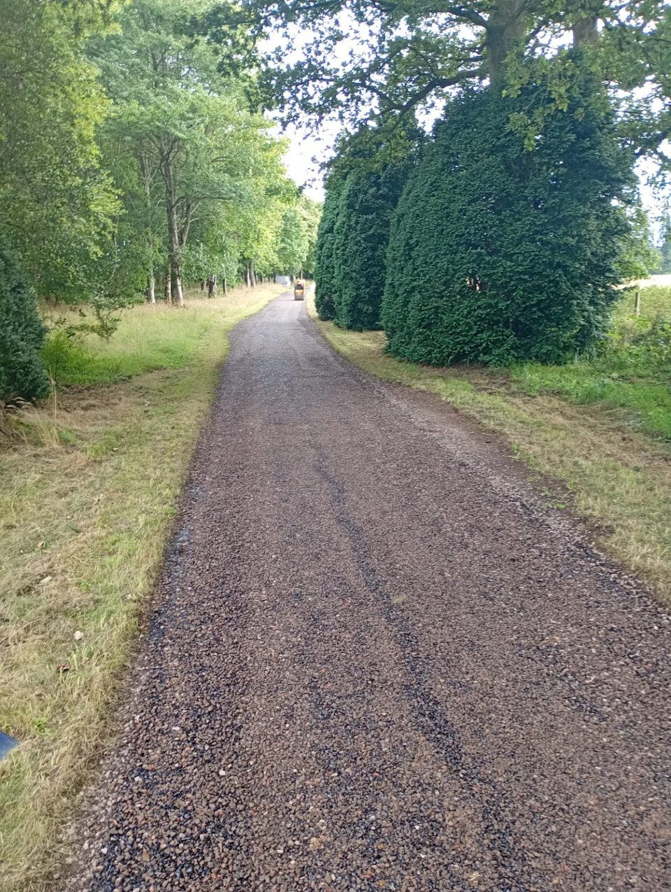 The same access road at Dollerie House in Crieff after two-coat hot polymer-modified bitumen tar-and-chip surface dressing